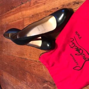 Christian Louboutin Black pumps- almost like new.